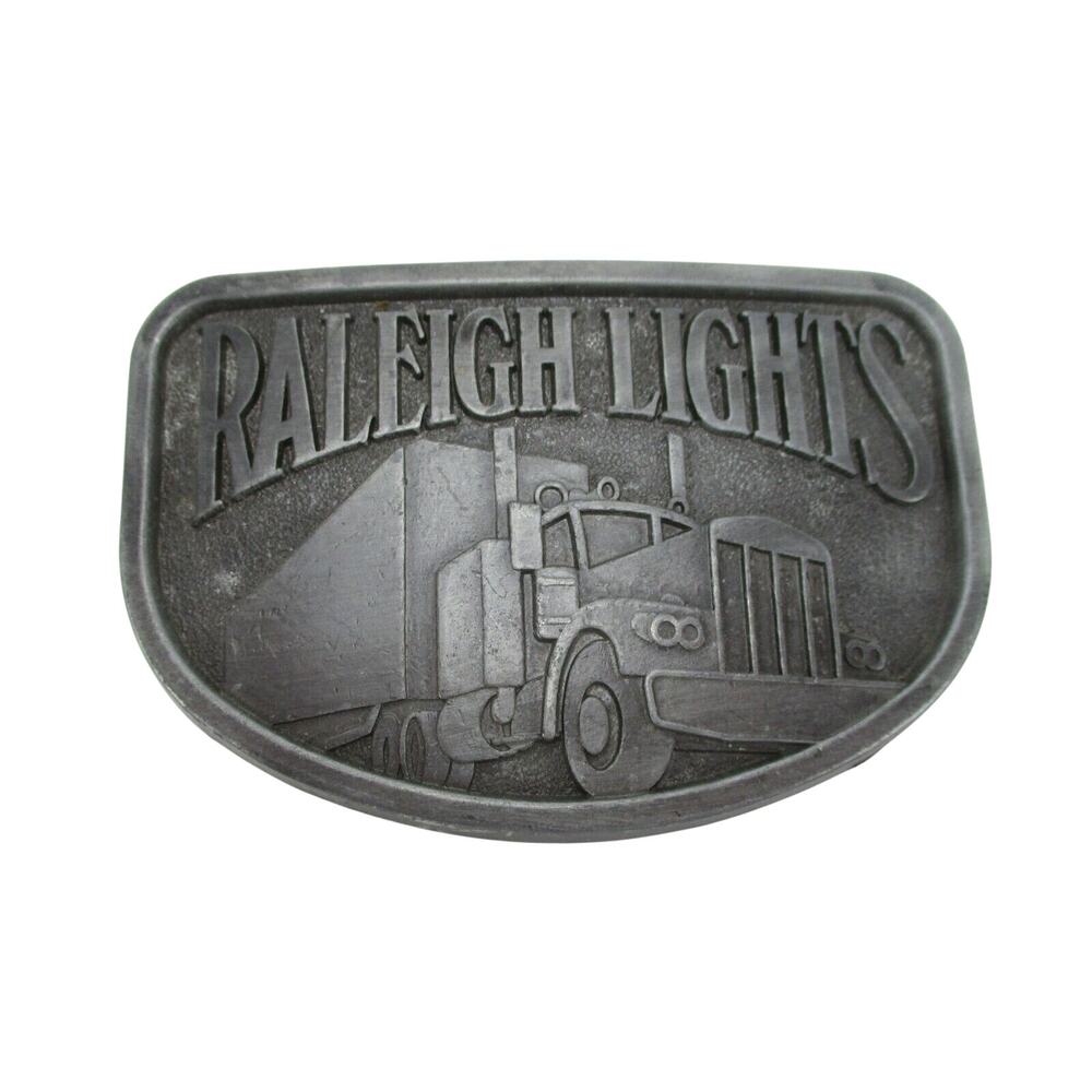 Raleigh Lights Belt Buckle Vintage Semi Truck Promotional Item